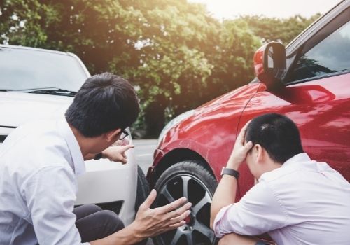 Picture of people arguing after a vehicle accident